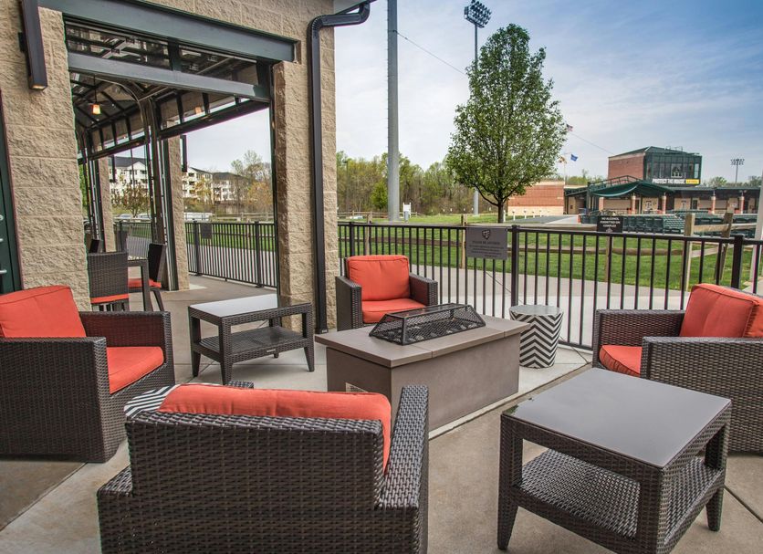 Courtyard by Marriott Aberdeen at Ripken Stadium patio with fire pit and stadium view in Aberdeen