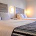 Inn on the Blues Ogunquit room with two beds and wood headboards