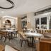 Paraiso de la Bonita, a Luxury Collection Resort, Riviera Maya dining room with tables, chairs and arched details in Puerto Morelos
