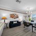 Carousel Suites -Redington Shores dining area with balcony and ocean view in Redington Shores