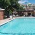 Holiday Inn Express & Suites Dallas - Grand Prairie I-20 pool with cabana and lounge chairs