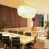 Fiesta Inn Morelia Altozano meeting room with conference table, chairs and large pendant light