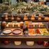 Trafo Hotel Baden in Baden breakfast buffet with pastries, fruit, cereals, and jars in a dining area
