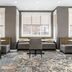 Residence Inn by Marriott Dayton Vandalia dining area with booths, chairs, and patterned carpet in Dayton