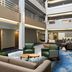 Fairfield Inn & Suites by Marriott Denver Southwest/Lakewood lobby with seating area and multi-story atrium in Lakewood