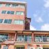 OYO 389 Sira Boutique Residence in Patong, exterior of a multi-story hotel against a blue sky