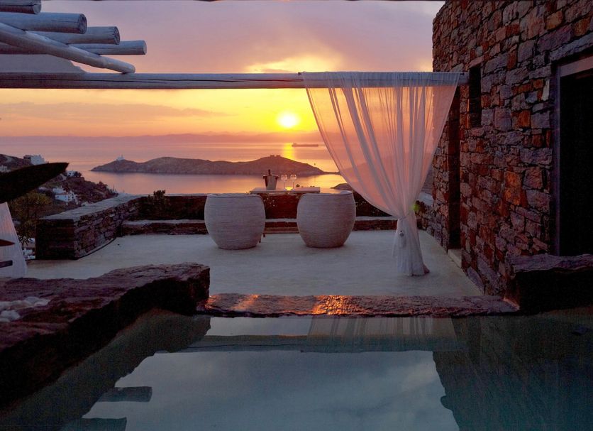 Aigis Suites Kea in Korissia: sunset sea view from a terrace with private pool and seating