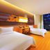Iu Hotel Tianjin Xianshuigu National Exhibition Center Yuntan University Town room with two twin beds and city view