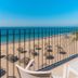 Krystal Puerto Vallarta balcony with ocean view over beach, umbrellas and lounge chairs in Puerto Vallarta