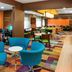 Fairfield Inn & Suites by Marriott Chicago Tinley Park lobby with colorful seating and business center