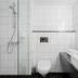 Aiden by Best Western Haugesund Airport bathroom in Avaldsnes with glass shower, toilet and sink