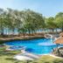 CC Beach Front Hotel in Playa Hermosa with ocean-view pool, hot tub, and shaded patio by the beach