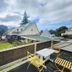 U Studios Paraparaumu, SureStay Collection by Best Western rooftop view over Paraparaumu Beach with outdoor seating