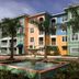 Mizner Place at Weston Town Center in Weston with colorful hotel buildings and a central fountain