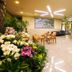 Hotel Matsukaze in Toyota lobby with floral arrangement, seating area, and display counter
