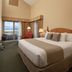St. Eugene Golf Resort & Casino room in Cranbrook with king bed, balcony, and mountain view