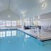 Residence Inn by Marriott South Bend Mishawaka indoor pool with lounge chairs and large windows