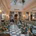 Relais & Châteaux Heritage Hotel Madrid lounge with patterned sofas and checkerboard floor