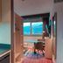 Zenitude Hotel Residences - Grenoble Alpexpo kitchenette with desk and mountain view in Grenoble