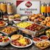 Best Western Plus New Barstow Inn & Suites breakfast buffet with pastries, fruit, eggs, bacon and juice