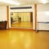 Matsuyama Youth Hostel in Matsuyama with a large indoor room and mirrored wall