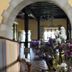 Hotel Palacio La Casona de Cerrazo in Cerrazo: stone archway and flower arrangement in lobby