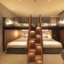 Hotel Keihan Namba Grande in Osaka, bunk-bed style guest room with twin beds and central staircase