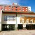 Hotel Diego de Almagro Puerto Montt exterior with entrance and flags in Puerto Montt