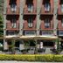 Hotel Vall D'Aneu in Esterri d'Àneu, brick facade with balconies and street-level terrace