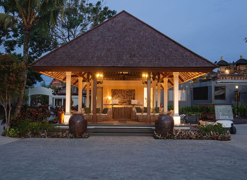Plataran Ubud Hotel And Spa in Denpasar, lit open-air pavilion entrance at dusk