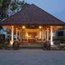 Plataran Ubud Hotel And Spa in Denpasar, lit open-air pavilion entrance at dusk
