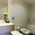 Argenta Tower Hotel & Suites Buenos Aires bathroom with tub, bidet, vanity and large mirror