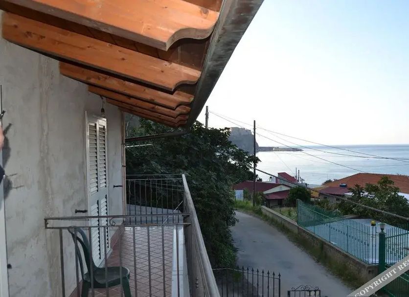 B&b Villa Chianalea in Scilla with balcony view of coastal road and sea