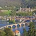 Best Western Plus Palatin Kongress Hotel in Wiesloch with river, stone bridge and hillside castle view