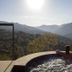 Vivood Landscape Hotel in Benimantell with a hot tub overlooking a mountain valley