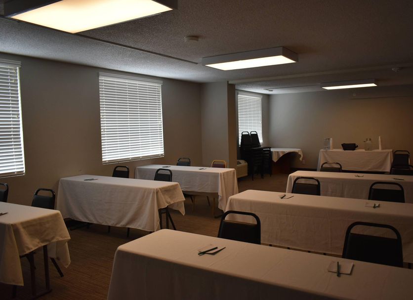 Quality Inn & Suites Garden Of The Gods in Colorado Springs meeting room with tables and chairs