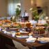 Hotel Massimo in Cecina breakfast buffet with pastries, fruit, stacked plates and serving dishes