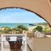 Chena Huts By Uga Escapes in Tissamaharama with ocean view from a luxury lounge and archway