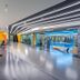 Gehua New Century Hotel Beijing fitness center with modern gym equipment and mirrored walls