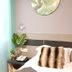 Leo Leisure Hotel @ Central Market Kuala Lumpur guest room with bed, side table and frosted window