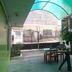 Casa de Huespedes Milena in Puerto Baquerizo Moreno: covered patio with seating and staircase