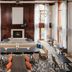 Residence Inn by Marriott West Orange lobby lounge with fireplace, tall windows, and seating area