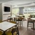 Fairfield by Marriott Inn & Suites Portland West/Beaverton breakfast area with tables and large windows in Beaverton