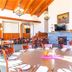 Hanah Mountain Resort And Country Club in Margaretville dining room with wooden ceiling and tables