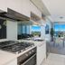 Silvershore Apartments on the Broadwater in Biggera Waters with modern kitchen and broadwater view