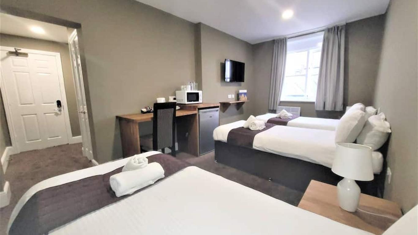New County Hotel & Serviced Apartments by RoomsBooked