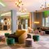 Leonardo Hotel Offenbach Frankfurt lobby lounge in Offenbach am Main with colorful seating and modern lighting