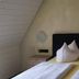 Etna Hotel & Ristorante in Veitshöchheim, attic double bed with sloped ceiling