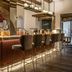 Petit Hôtel Confidentiel in Chambéry bar interior with illuminated counter and high stools