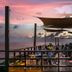 Atami Escape Resort in La Libertad with beachfront terrace dining and ocean sunset views